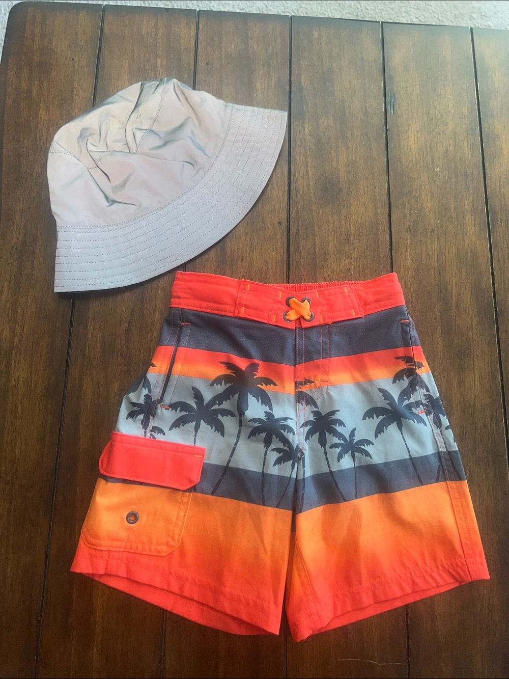 Boys Tropical Palm Stripe Swim Trunks in Orange and Gray